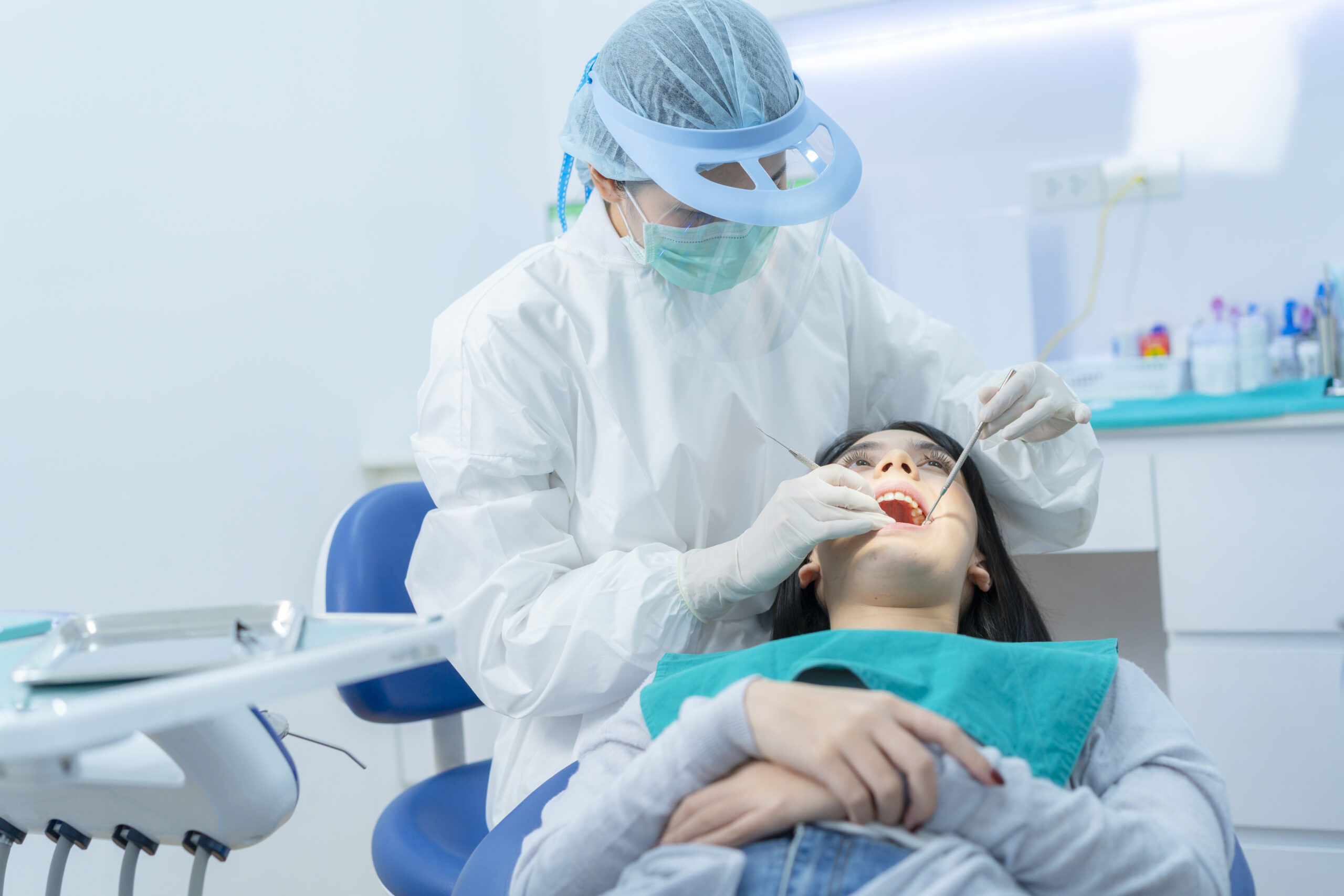 dentist examining tooth